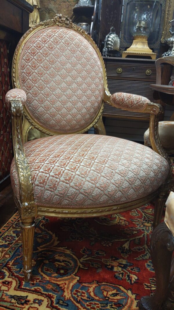 Pair of 19th Century Gilt French Louis XVI Armchairs - M.D. Antiques in Richardson and Dallas Tx.