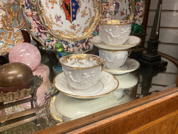 Set of Thirteen Cups and Saucers